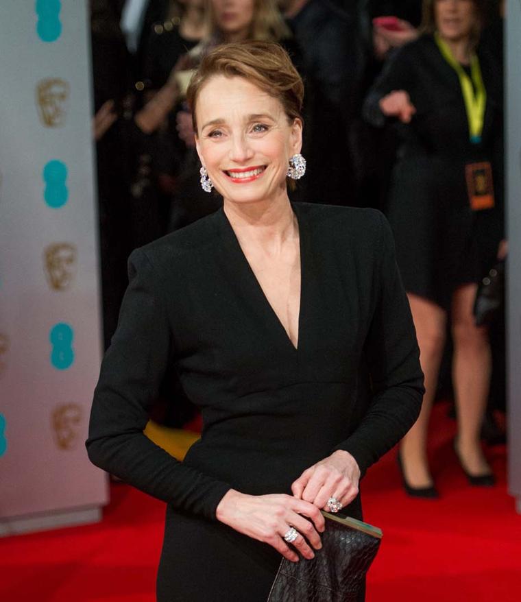 Dame Kristin Scott Thomas attended this year's BAFTA awards ceremony wearing a trio of pieces from Adler, including diamond earrings and an impressive Chameleon diamond ring.